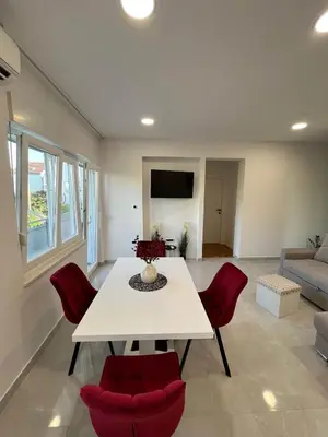 TV i/ili zabavni centar u objektu Apartments Luce - Dome