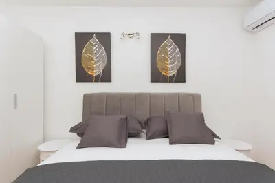 Krevet ili kreveti u jedinici u objektu Apartman MG Makarska