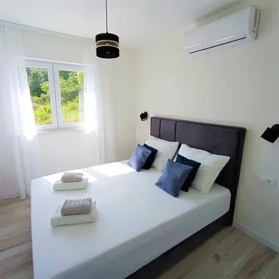 Krevet ili kreveti u jedinici u objektu Apartments Mirko