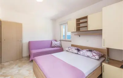 Krevet ili kreveti u jedinici u objektu One-Bedroom Apartment In Krvavica