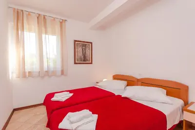 Krevet ili kreveti u jedinici u objektu Apartments and rooms by the sea Brela, Makarska - 13118