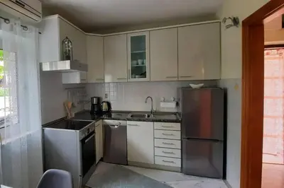 Kuhinja ili čajna kuhinja u objektu Apartments by the sea Postira, Brac - 12291