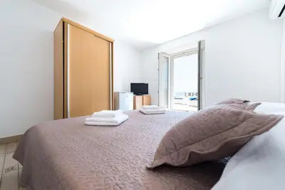Krevet ili kreveti u jedinici u objektu Riva Rooms
