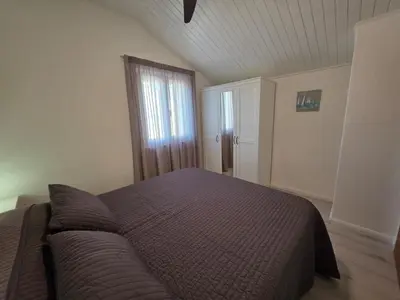 Krevet ili kreveti u jedinici u objektu Lantana Apartment