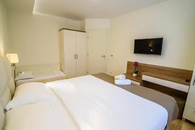 Krevet ili kreveti u jedinici u objektu Apartments Leone Lukas