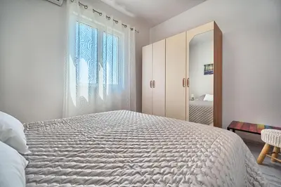 Krevet ili kreveti u jedinici u objektu Apartments Irena