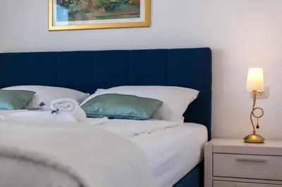 Krevet ili kreveti u jedinici u objektu Villa Makarac - Heated Pool, Beach 140m & Kids Playground I Brač