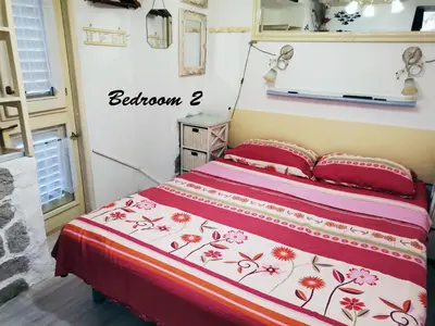Krevet ili kreveti u jedinici u objektu Apartment Alena with terrace and garden Center Jelsa