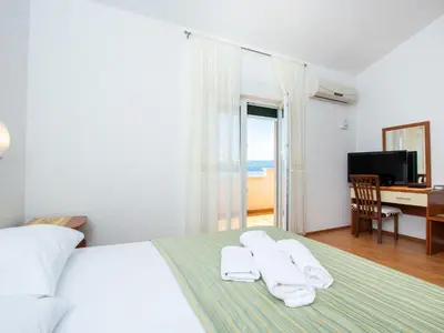 Krevet ili kreveti u jedinici u objektu Cozy Seaside Apartment Celina