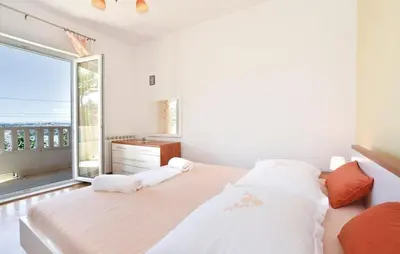 Krevet ili kreveti u jedinici u objektu Family friendly apartments with a swimming pool Podstrana, Split - 13828