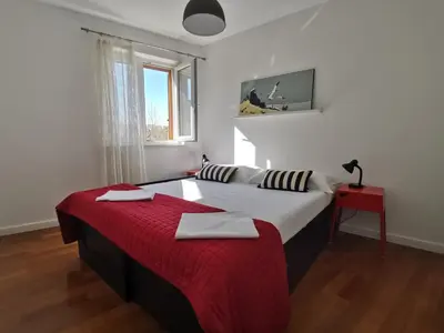Krevet ili kreveti u jedinici u objektu APARTMAN R.R. OMIŠ
