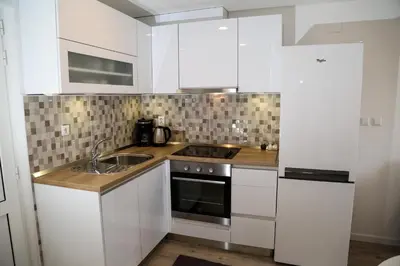 Kuhinja ili čajna kuhinja u objektu Apartments Sunset
