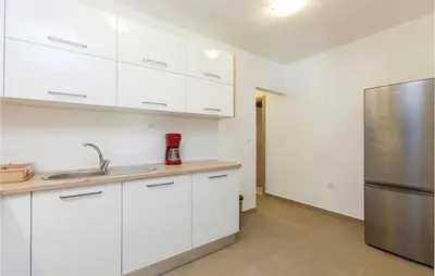 Kuhinja ili čajna kuhinja u objektu Three-Bedroom Apartment In Split