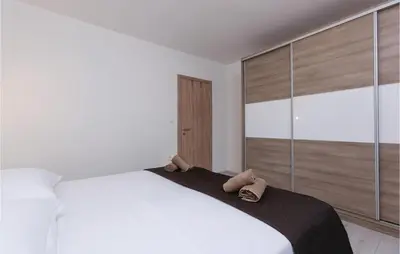 Krevet ili kreveti u jedinici u objektu Three-Bedroom Apartment In Split