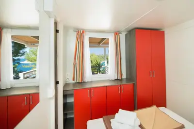 Krevet ili kreveti u jedinici u objektu Kamp Vira Mobile Homes