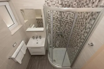Kupaonica u objektu APARTMANI VUJČIĆ