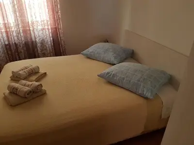 Krevet ili kreveti u jedinici u objektu Apartments with a parking space Omis - 13785