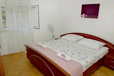 Krevet ili kreveti u jedinici u objektu Family friendly house with a swimming pool Kostanje, Omis - 14176