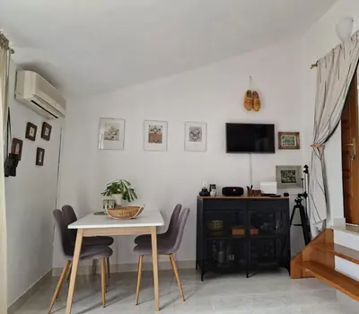 TV i/ili zabavni centar u objektu Home sweet home