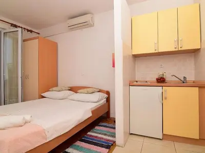 Krevet ili kreveti u jedinici u objektu Apartments Ivan