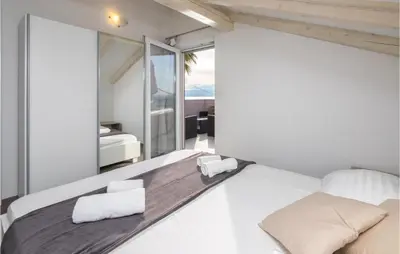Krevet ili kreveti u jedinici u objektu Three-Bedroom Holiday Home In Suhi Potok