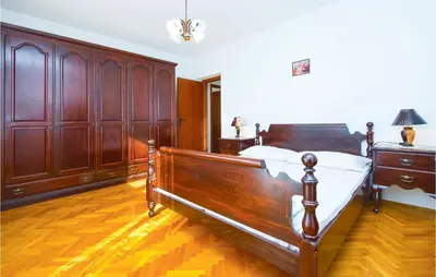 Krevet ili kreveti u jedinici u objektu Three-Bedroom Apartment In Podstrana