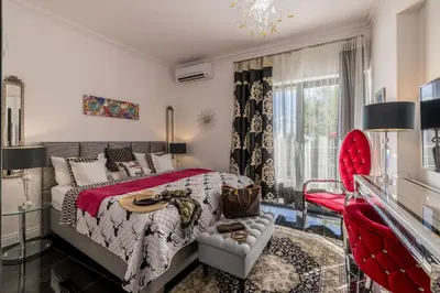 Krevet ili kreveti u jedinici u objektu Villa Berfami Excelsior - Jacuzzi & Pool