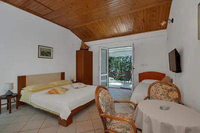 Krevet ili kreveti u jedinici u objektu Apartments by the sea Cove Pokrivenik, Hvar - 14345