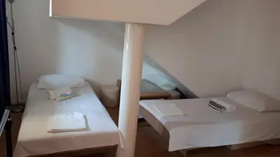 Krevet ili kreveti u jedinici u objektu Apartments and Rooms Zvjezdana
