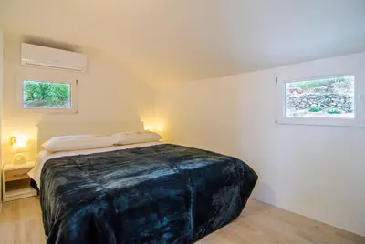 Krevet ili kreveti u jedinici u objektu Holiday Home Bliss