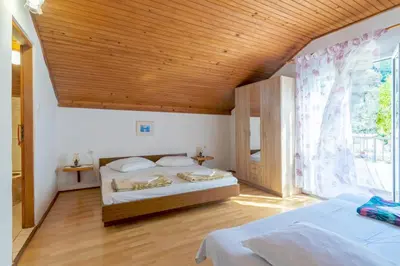 Krevet ili kreveti u jedinici u objektu Apartments by the sea Cove Vela Stiniva, Hvar - 14511