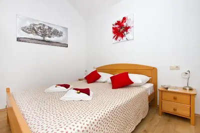 Krevet ili kreveti u jedinici u objektu Family apartment