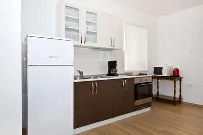 Kuhinja ili čajna kuhinja u objektu Family apartment