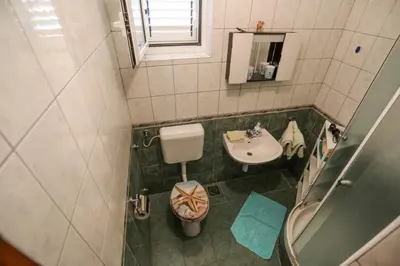 Kupaonica u objektu Apartment and Rooms Marlene