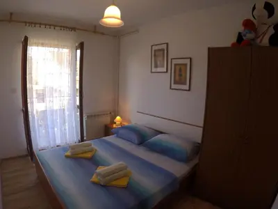 Krevet ili kreveti u jedinici u objektu Antique apartment with balcony