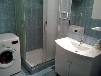 Kupaonica u objektu Antique apartment with balcony
