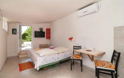 Krevet ili kreveti u jedinici u objektu Holiday Home Blossom