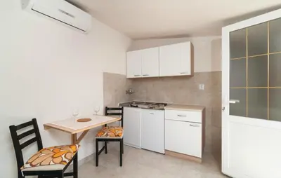 Kuhinja ili čajna kuhinja u objektu Holiday Home Blossom