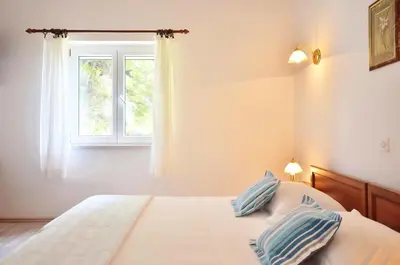 Krevet ili kreveti u jedinici u objektu Apartments Perla