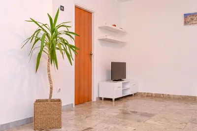 TV i/ili zabavni centar u objektu Apartment Mediteran