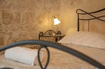 Krevet ili kreveti u jedinici u objektu Villa Mama - Traditional Apartments in Omis, free parking