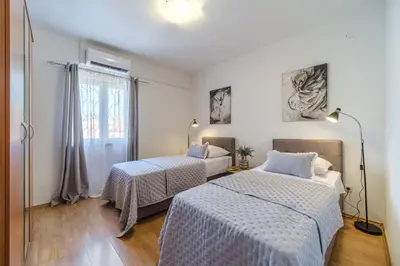 Krevet ili kreveti u jedinici u objektu Villa TM with private heated pool, poolhouse & private garage