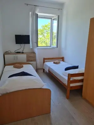 Krevet ili kreveti u jedinici u objektu lovely apartment