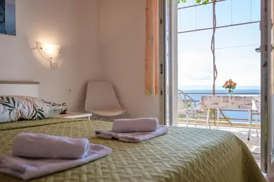Krevet ili kreveti u jedinici u objektu Rooms Sani