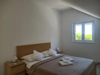 Krevet ili kreveti u jedinici u objektu Apartments Toro