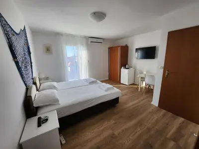 Krevet ili kreveti u jedinici u objektu Apartmani Neva Supetar