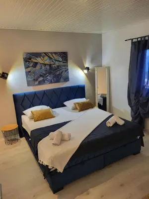 Krevet ili kreveti u jedinici u objektu Apartments Mikas