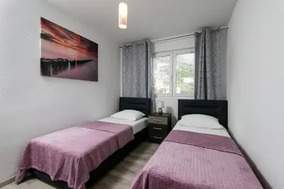 Krevet ili kreveti u jedinici u objektu Apartments Mikas