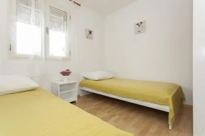 Krevet ili kreveti u jedinici u objektu Apartments by the sea Stomorska, Solta - 14960