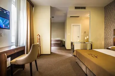 Krevet ili kreveti u jedinici u objektu Central Luxury Rooms